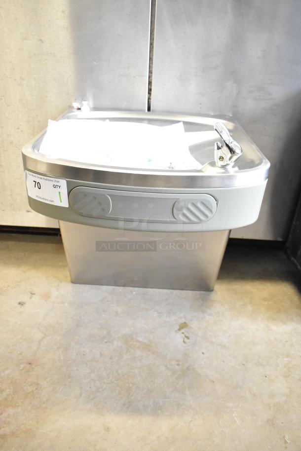 Brand new Elkay KM35-2 wall mount water fountain, stainless steel, minor scratches, auction tag indicating unit 70.