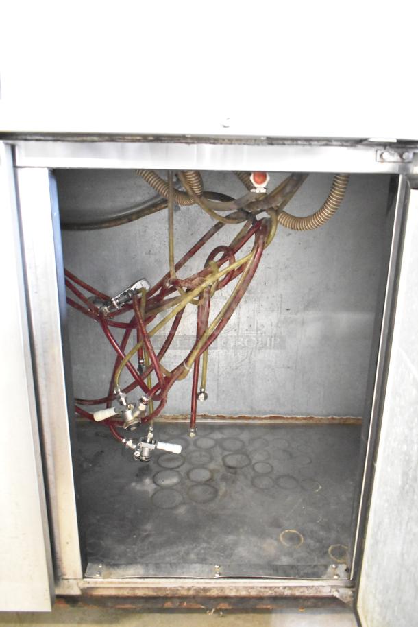 Micro Matic MDD-78 S kegerator interior with multiple hoses and connectors; used condition.