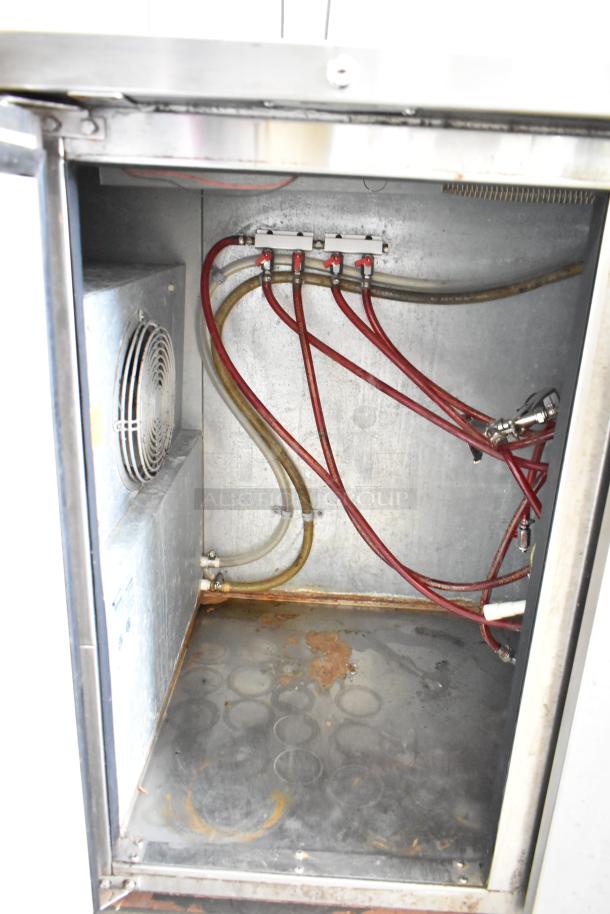 Micro Matic MDD-78 S kegerator interior, showing red hoses, cooling fan, and connection valves. Visible wear and rust noted.