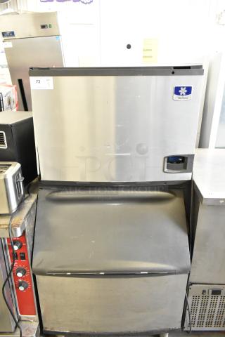 Manitowoc ID0452A-161 commercial ice head and bin, 115V, 1 phase, stainless steel, visible wear, Manitowoc logo on unit.