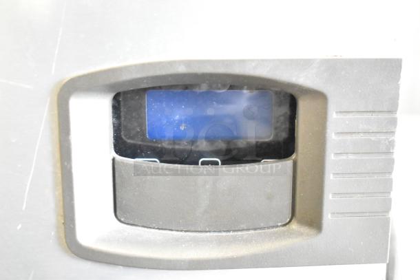 Manitowoc ID0452A-161 commercial ice head on bin, 115 volts, 1 phase, visible digital display, good condition.