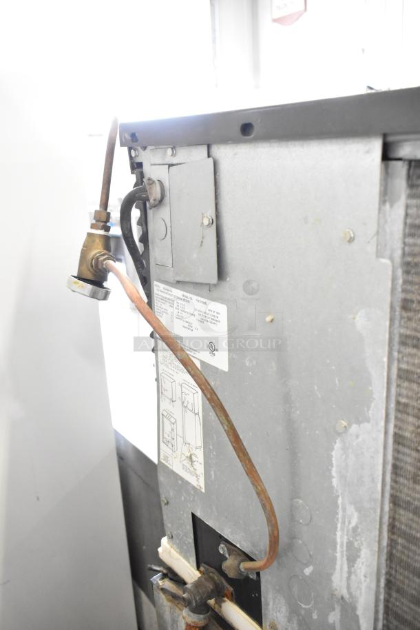 Manitowoc ID0452A-161 ice head on bin with visible wiring and labeling. Commercial use, 115V, 1 phase.