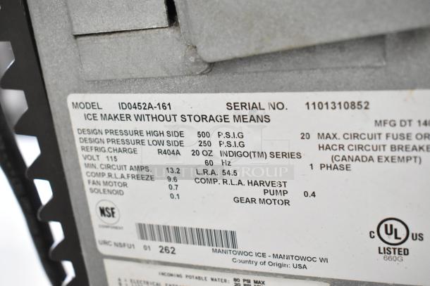 Manitowoc ID0452A-161 commercial ice maker label showing specs: 115 volts, R404A refrigerant, 1 phase, UL listed.
