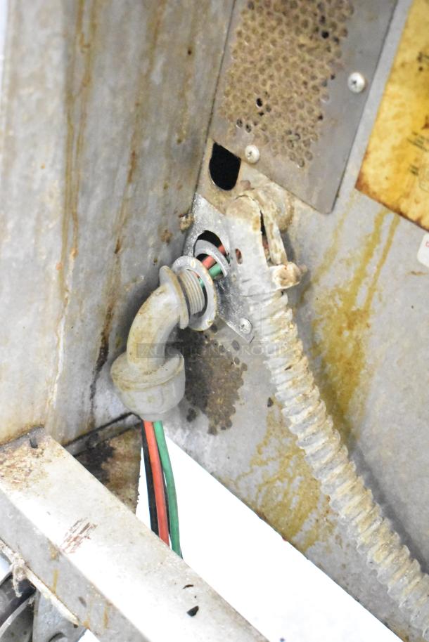 Blodgett Mark-V-111 commercial convection oven close-up; visible wiring and connections. Model has wear, 208-230V, 1 Phase.