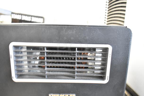 Hercules Heat AGL-05PB portable heater, 120V, 1 Phase, black exterior with front vent grille, compact design.