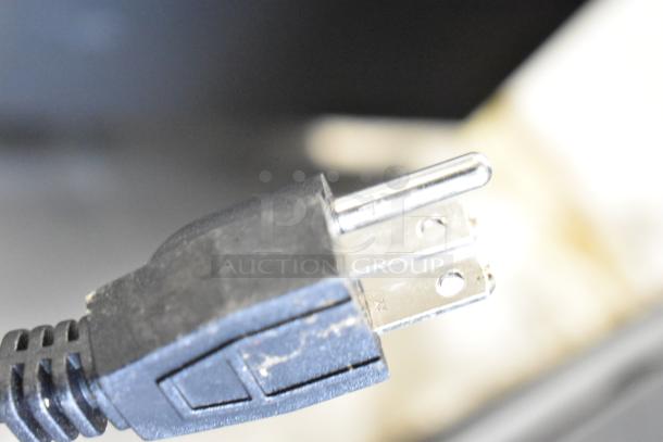 Hercules Heat AGL-05PB portable heater plug, 120 volts, 1 phase, showing minor wear on the surface.