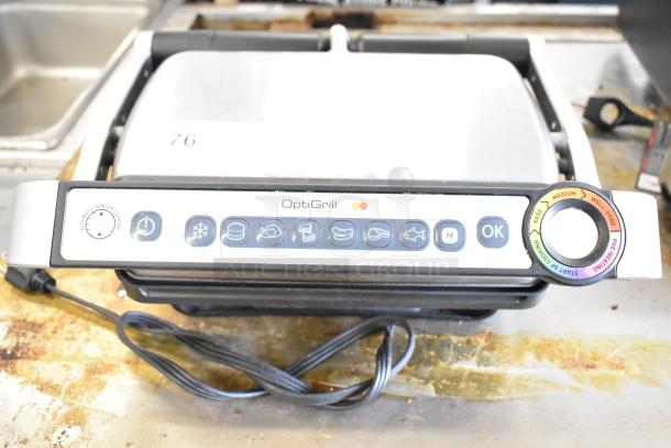 T-Fal OptiGrill Panini Press, 115 Volts, 1 Phase. Features touch controls, automatic sensor cooking, and adjustable settings.