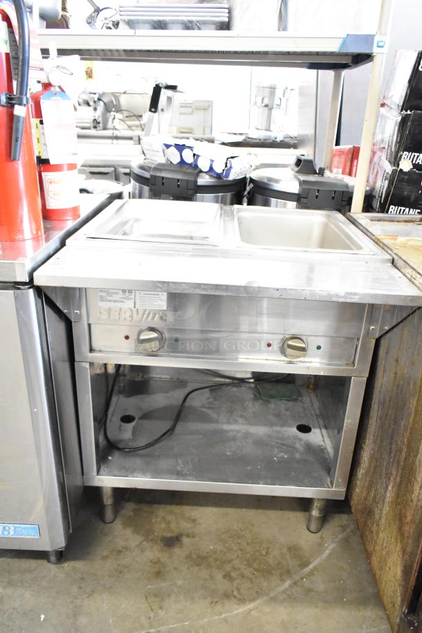 2021 ServIt 423EST2WOPB commercial electric steam table, two-pan open well, 120V, 1 phase, good condition.