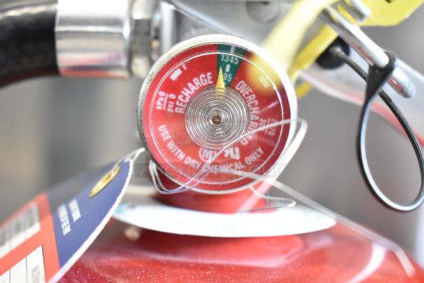 Two fire extinguishers, including Buckeye brand; features include pressure gauge and labels. Local pickup only.