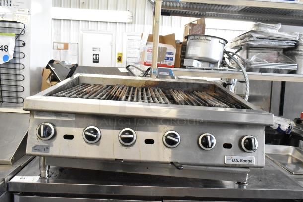 US Range Commercial Gas Charbroiler Grill, countertop model, stainless steel, multiple control knobs, visible wear.