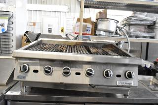 US Range Commercial Gas Charbroiler Grill, countertop model, stainless steel, multiple control knobs, visible wear.