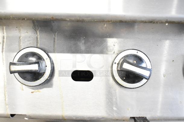 US Range Commercial Gas Charbroiler Grill control knobs, stainless steel finish, used condition, countertop model.