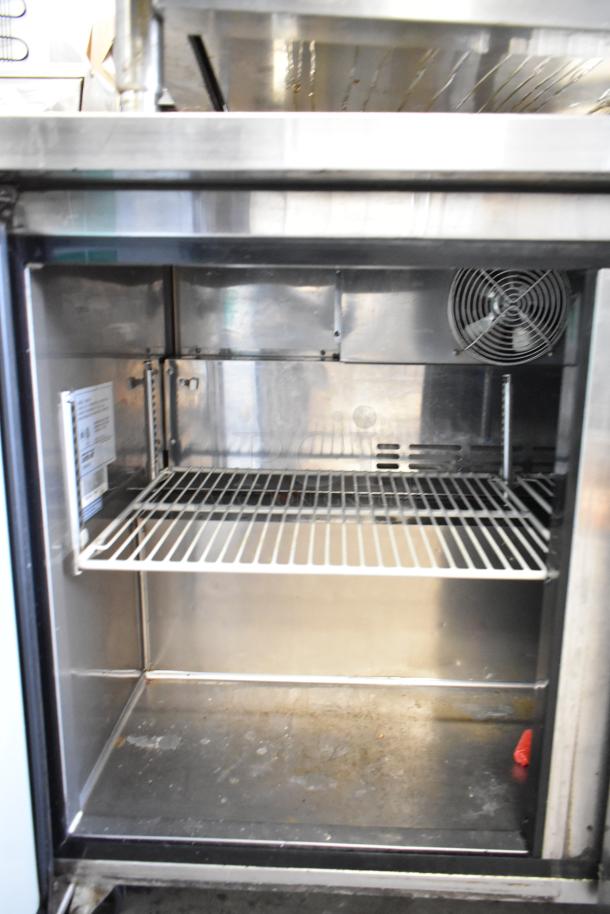 Turbo Air MUR-48 commercial undercounter cooler, 2 doors, on casters. Features stainless interior, visible fan, 115V, 1 Phase.