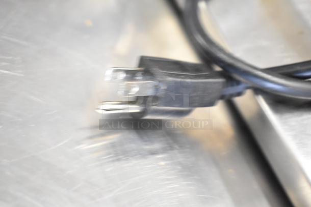 Close-up of a power plug for the Dukers DSP48 Commercial Sandwich Salad Prep Table. 115 Volts, 1 Phase.