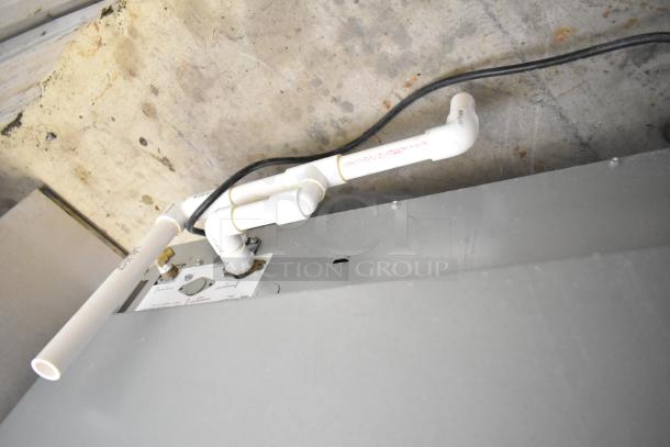 2022 Manitowoc URF0310A-161B undercounter ice machine, 115V, 1 phase, showing rear plumbing connections.