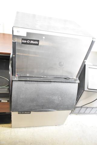 Ice-O-Matic ICE0400FW4 ice head on B40PSB bin, 115V, 1 Phase, commercial-grade, stainless steel, used condition.