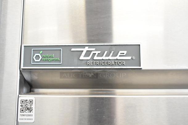 2018 True TG2R-2S-HC 2 Door Reach-In Cooler, stainless steel, natural refrigerant label, QR code for service.