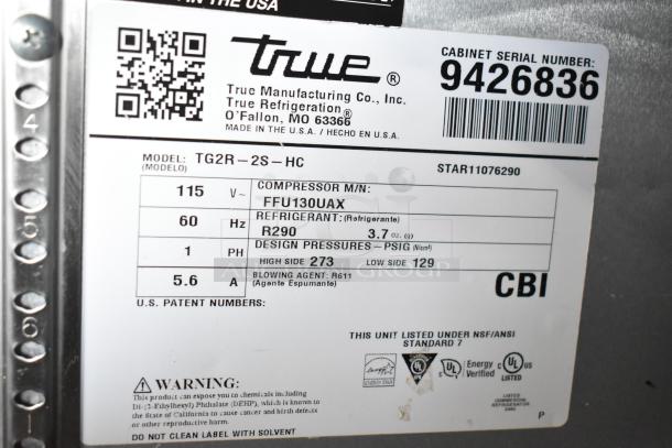 Label of 2018 True TG2R-2S-HC cooler showing model, 115V power, refrigerant R290, serial number 9426836, NSF certified.