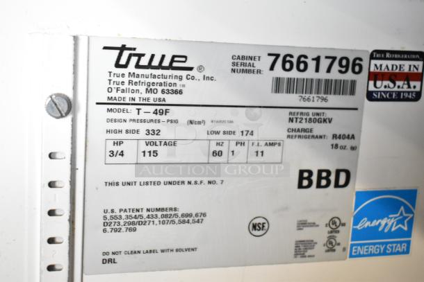 True T-49F commercial 2-door reach-in freezer label showing model, voltage (115V), phase (1), and refrigerant info.