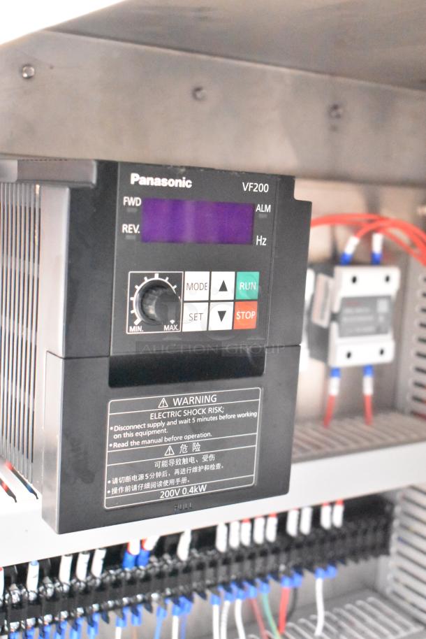 Seny Machinery floor slicer and conveyor controls, featuring Panasonic VF200 module. Warning label and wiring visible. 220V.