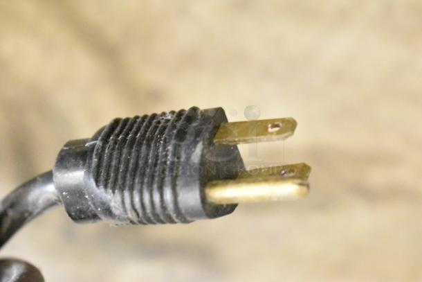 Close-up of a power plug for a Vita-Mix VM0800A Commercial Countertop Milkshake Mixer, 120 volts, 1 phase.