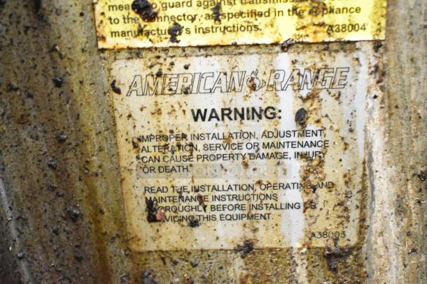 American Range label on a dirty surface with warning: "Improper installation... can cause damage or death." Model A38003.