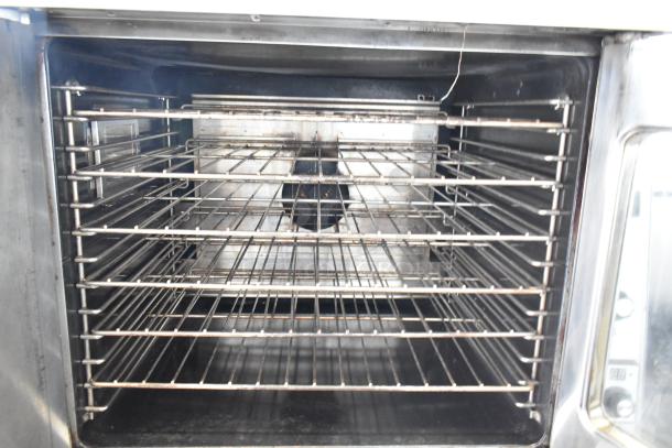 2017 Garland MCO-GS-10S convection oven, view-through doors, thermostatic controls, 60,000 BTU, stainless interior.