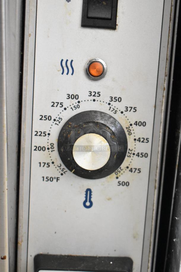 Close-up of Garland MCO-GS-10S convection oven control panel, showing temperature dial and indicator light.
