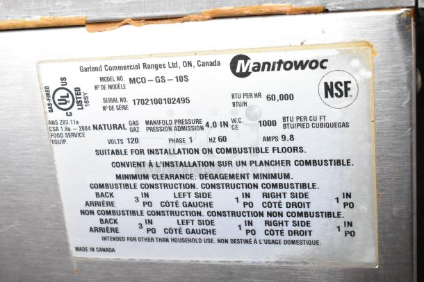 Label on Garland MCO-GS-10S convection ovens shows model, natural gas use, 60,000 BTU, and installation instructions.