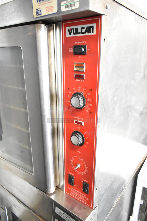 2 Vulcan SG4D gas convection ovens with view-through doors, thermostatic controls, and a red control panel. Model: SG4D.