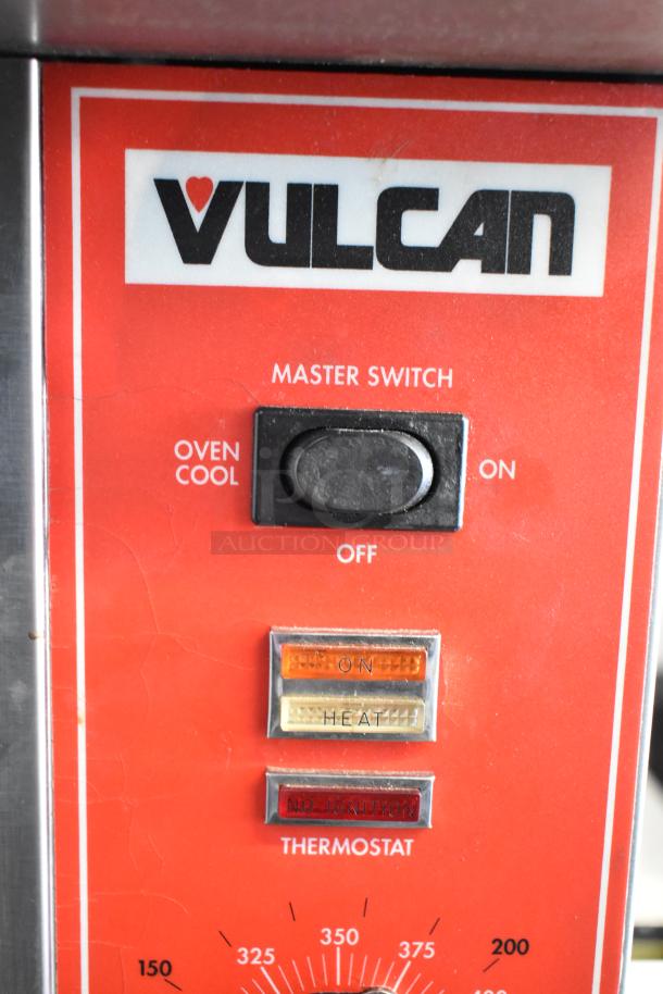 Vulcan SG4D convection oven control panel with master switch, temperature gauge, and status indicators.