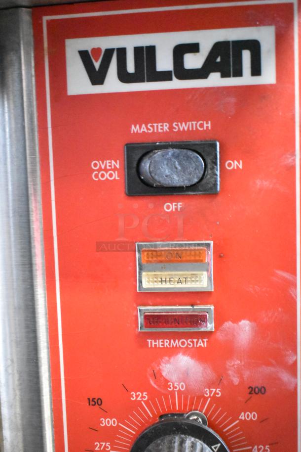 Vulcan SG4D convection oven controls showing master switch, status lights, and temperature dial for commercial use.