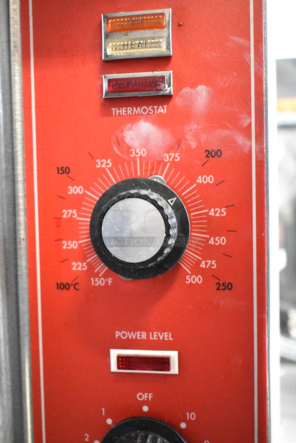 Vulcan SG4D commercial convection oven thermostat and power controls, red panel with temperature and power level markings.