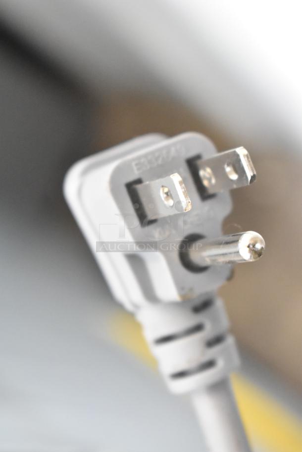 Vissani MDFF7SS power cord close-up, showing standard plug, for brand new scratch and dent reach-in cooler with freezer.