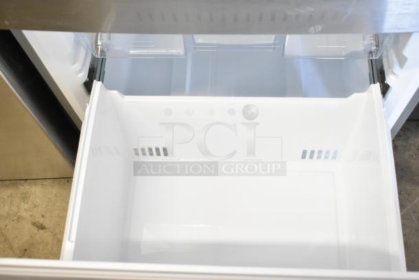 "BRAND NEW SCRATCH AND DENT Vissani MDBF18SS reach-in cooler with freezer drawer open, 115 volts, 1 phase."