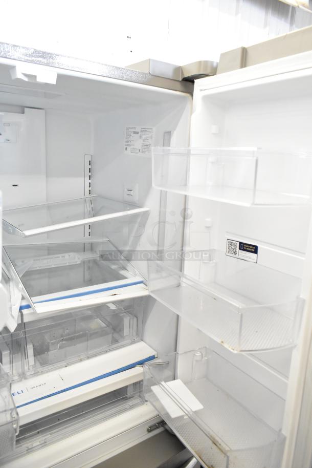 Brand new Frigidaire FRFC2323ASB cooler with freezer drawer, ice/water dispenser, and shelves; 115V, 1 Phase, scratch and dent.