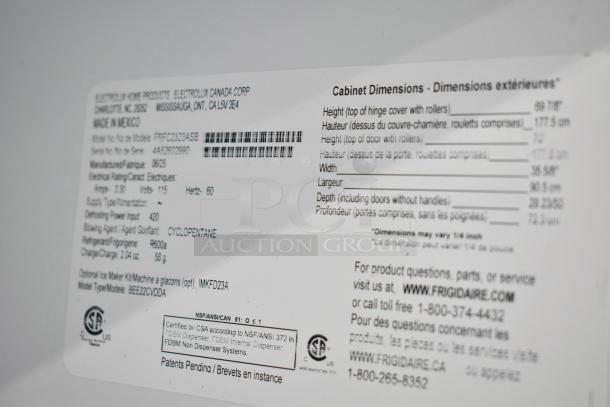 Frigidaire label on model FRFC2323ASB cooler, detailing specs: 115 volts, 1 phase, ice/water dispenser, made in Mexico.