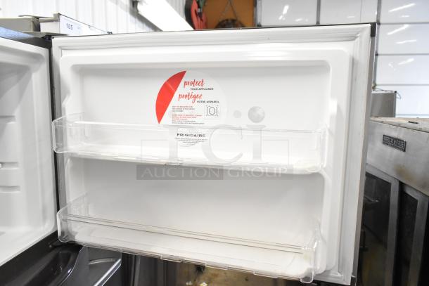 Brand new 2024 Frigidaire FFTR20M5VS7 cooler with freezer, 115 volts, 1 phase. Scratch and dent condition, door label shown.