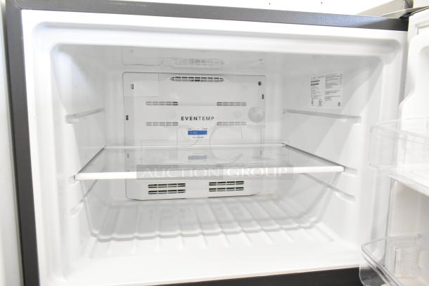 Brand new 2024 Frigidaire FFTR20M5VS7 reach-in cooler with freezer, 115V, showing interior shelving and Eventemp label.