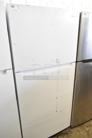 Brand new Vissani MDTF18WHR5 reach-in cooler with freezer, 115V, 1 phase, minor scratches and dents visible.