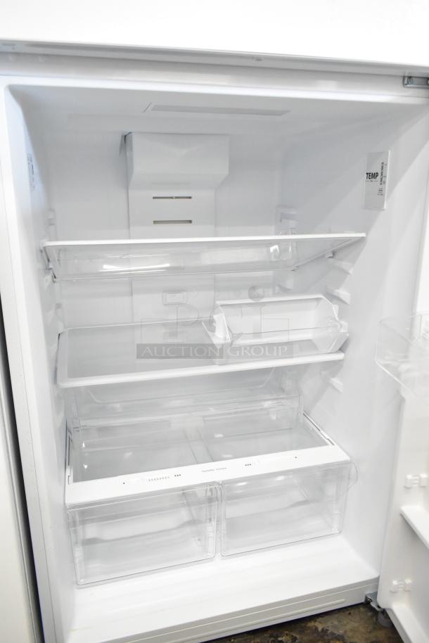 Brand new Vissani MDTF18WHR5 cooler with freezer, 115 volts, 1 phase. Interior shelves visible. Scratch and dent condition.