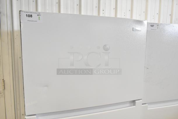 Brand new 2024 Vissani MDTF18WHR reach-in cooler with freezer, 115V, 1 phase. Minor dents visible. Auction label "108".