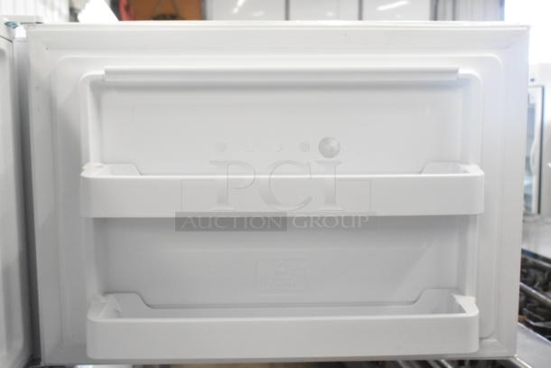 2024 Vissani MDTF18WHR reach-in cooler/freezer door interior, brand new, with storage shelves. 115V, 1 phase.