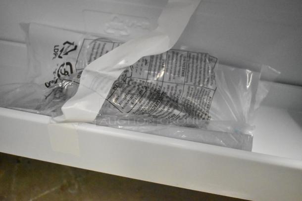 Brand new Vissani MDTF18WHR Reach-In Cooler with Freezer, 115 Volts, 1 Phase; minor cosmetic scratches and dents.