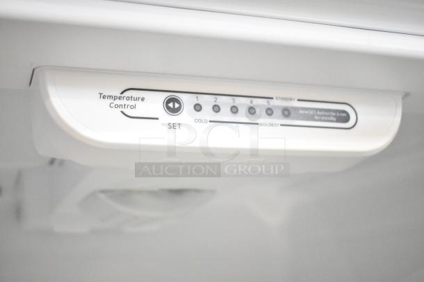 Brand new Vissani MDTF18WHR cooler and freezer. Features temperature control panel. 115V, 1 Phase. Scratch and dent condition.