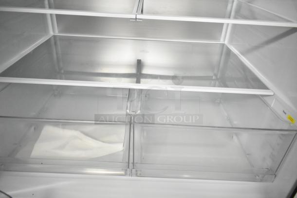 2025 LG LF30S8210S/01 reach-in French door cooler interior, featuring adjustable glass shelves and clear drawer freezer.