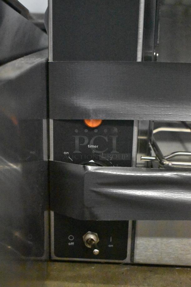 Brand new Vollrath 922CM424035 JW30 cheese melter, 240V, 1-phase. Scratch and dent condition. Timer and on/off controls visible.