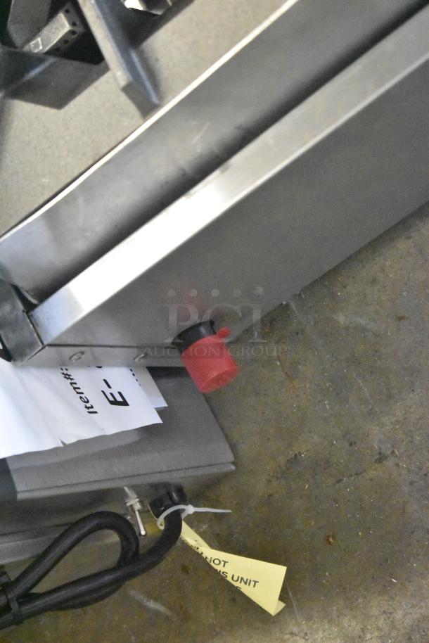 Brand new Cooking Performance Group R-CPG-24-NL 4 Burner Natural Gas Countertop Range, 88,000 BTU, minor scratches visible.