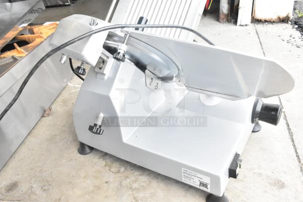 2021 Backyard Pro 554SL112E meat slicer, 12" blade, manual gravity feed, built-in sharpener, 120V, excellent condition.