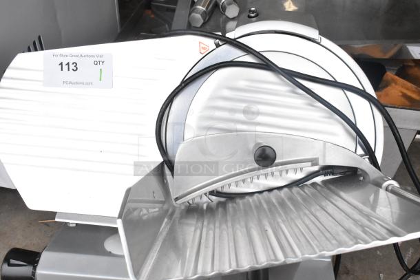 2021 Backyard Pro 554SL112E meat slicer with 12" blade, manual gravity feed, blade sharpener. Includes voltage and phase details.